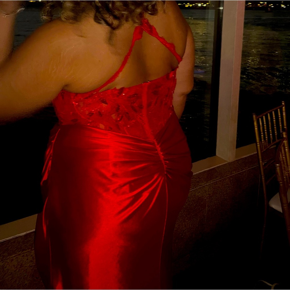 Red prom dress with lace top and a slit on the leg , was very flattering!